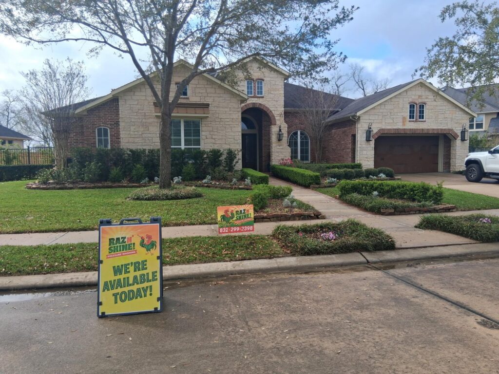 Pressure washing residential home driveway and exterior cleaning in TX